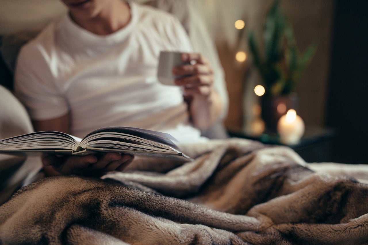 man reading before bed