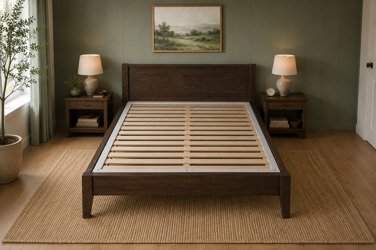 Bunkie Board wooden slats inset into a wooden bed frame in a bedroom with lamps and a painting on the wall.