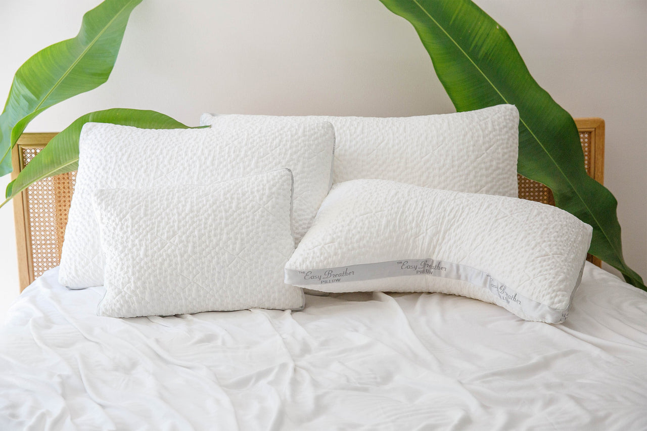 White pillows on mattress