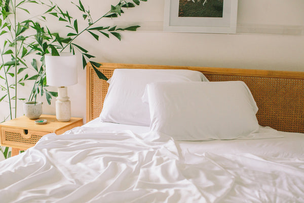 Breathable white bedding on a warm modern bed for night warmth comfort