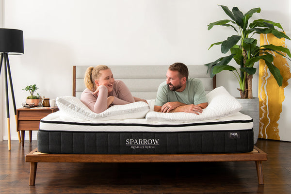 Couple lying on Sparrow mattress