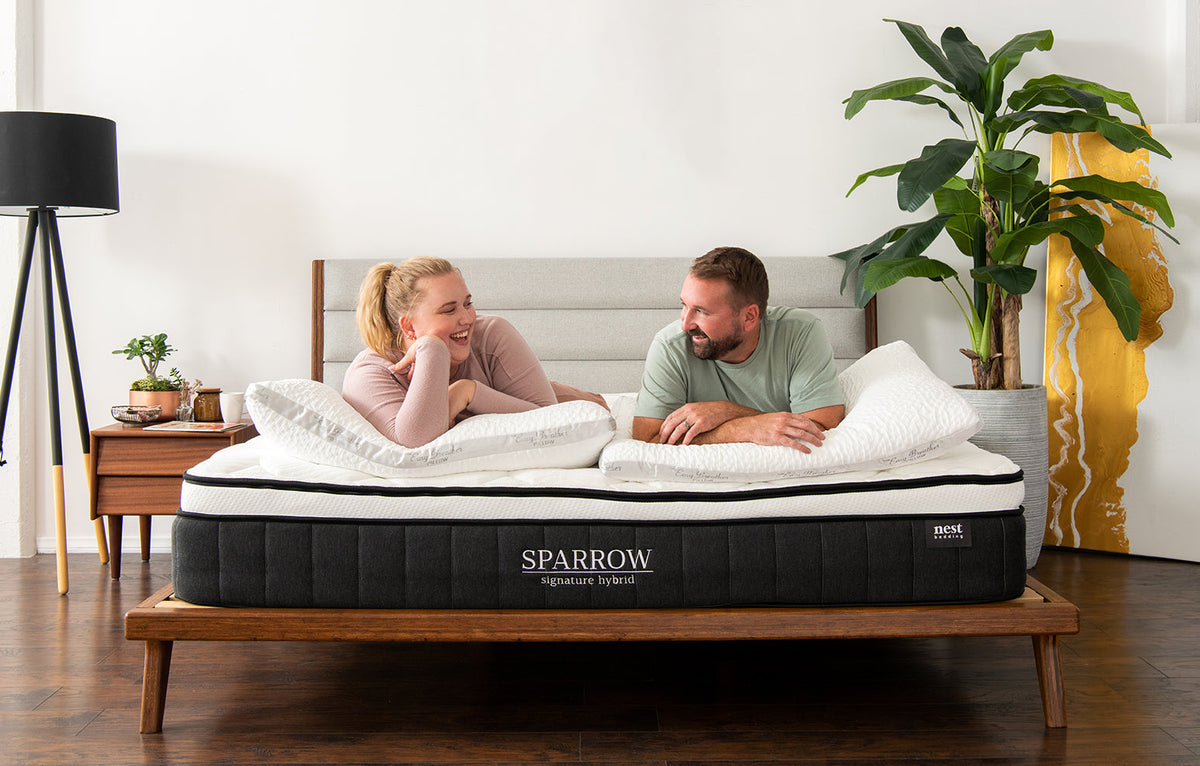 Couple lying on Sparrow mattress