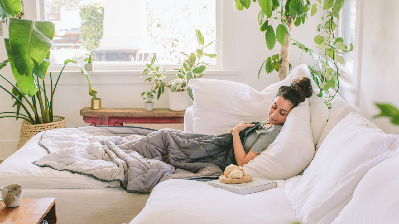 Lying down in bed with breakfast