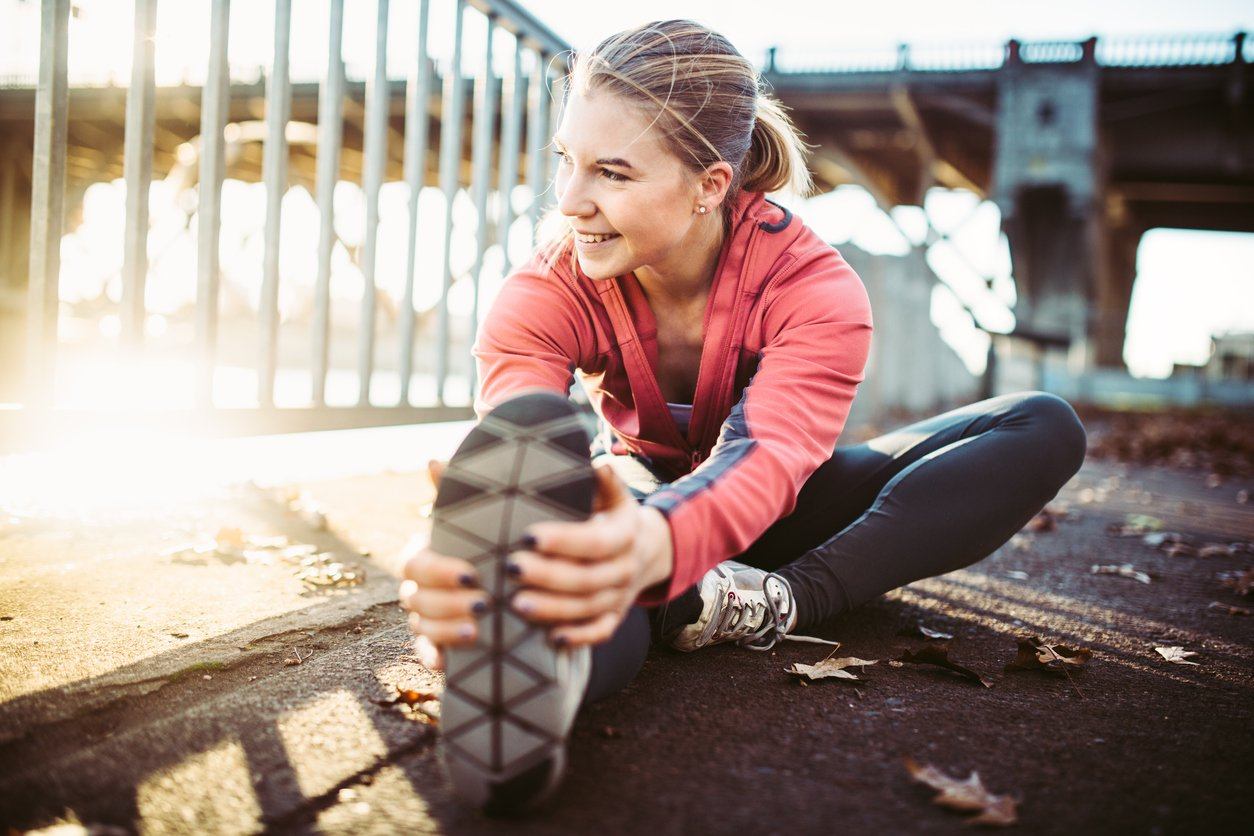 Athlete stretching before workout