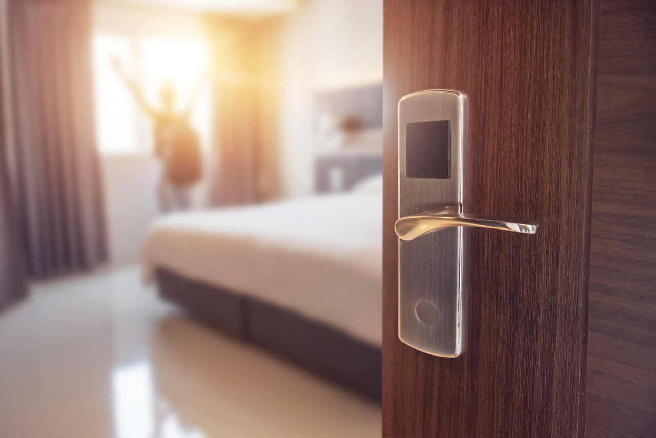 Hotel door opening to person recovering from jet lag