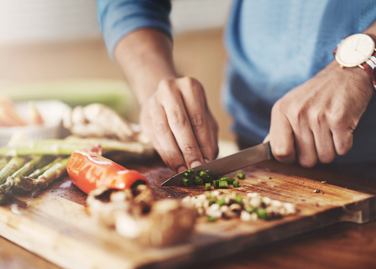 Chopping vegetables to live healthier for a better night’s sleep