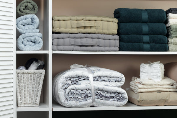 linen closet with extra pillowcases