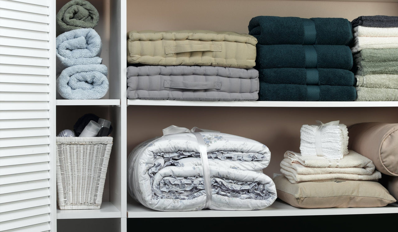 linen closet with extra pillowcases