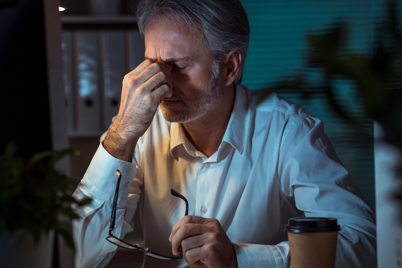 man stressed with insomnia at night