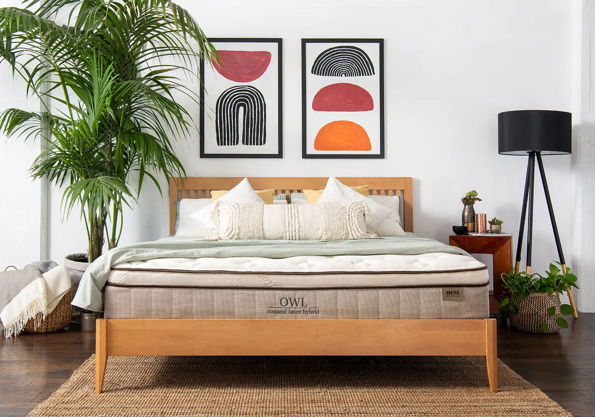 owl mattress in bedroom with bedspread 