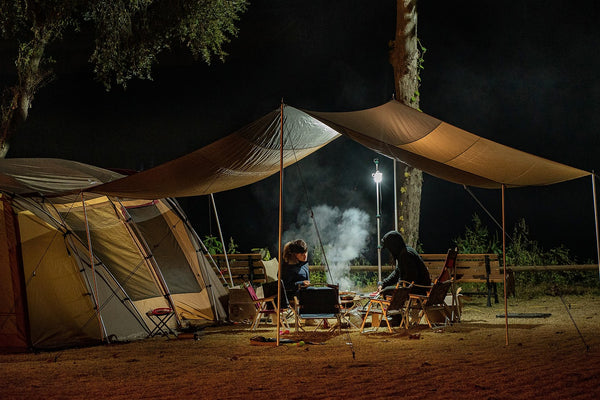 people camping in tent
