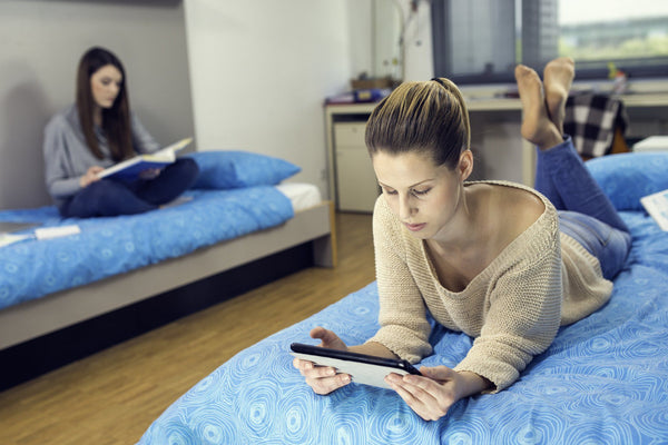 roommates lounging in dorm room