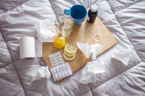 sick supplies on bed to boost your immune system