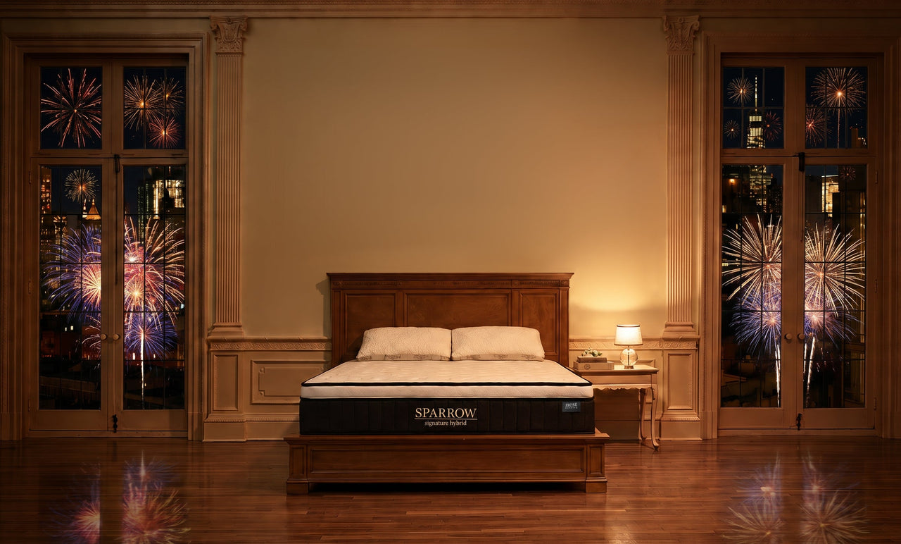 sparrow mattress in a luxury bedroom with fireworks all around outside the windows