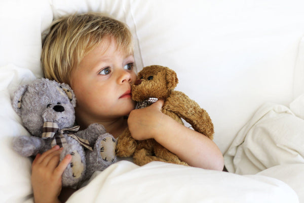 big kid bed safety with a toddler in bed