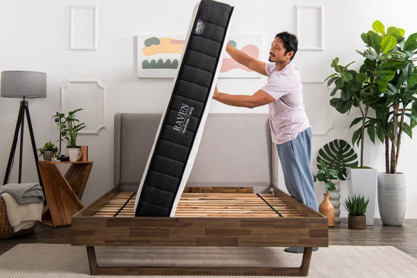 raven mattress getting flipped by a man