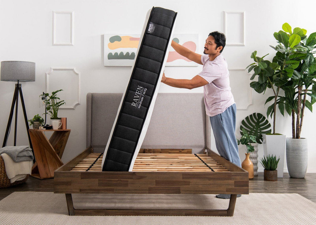 raven mattress getting flipped by a man
