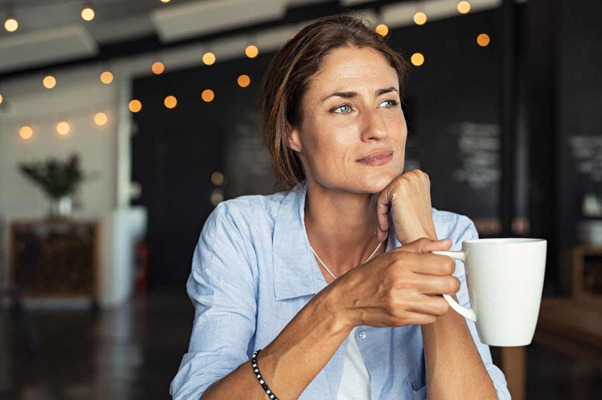 woman drinking tea before bedtime routines