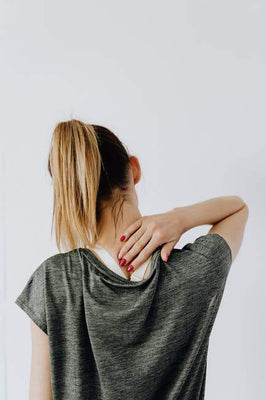 woman having neck pain 