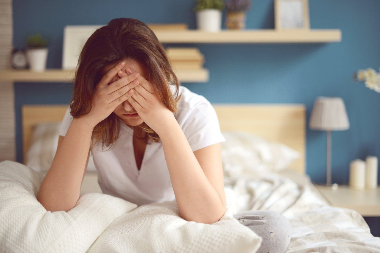 woman in bed needs sleep tips for fibromyalgia