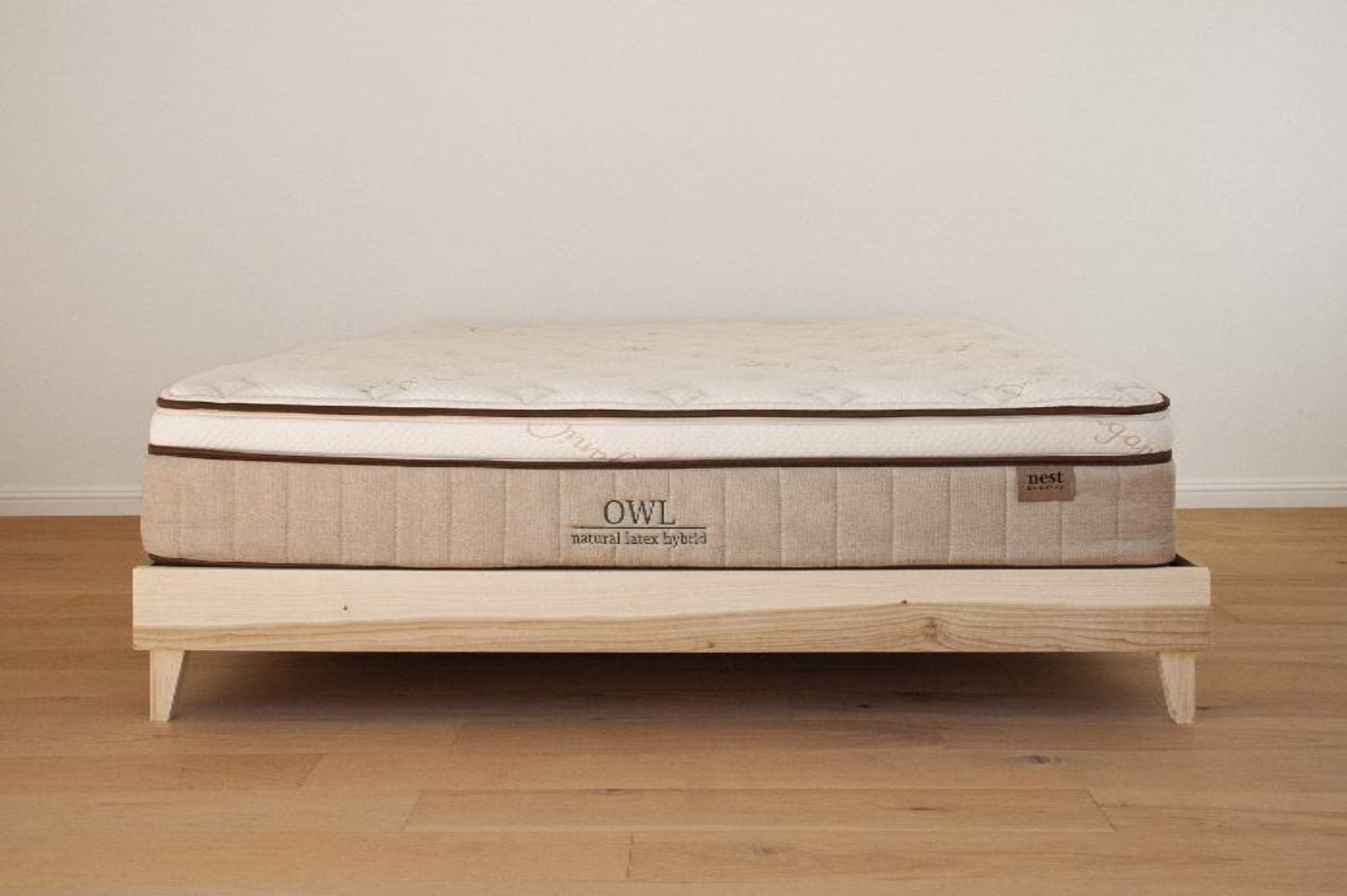 The Woodland Platform Sunlit Ash Front with an Owl Natural Latex Hybrid mattress